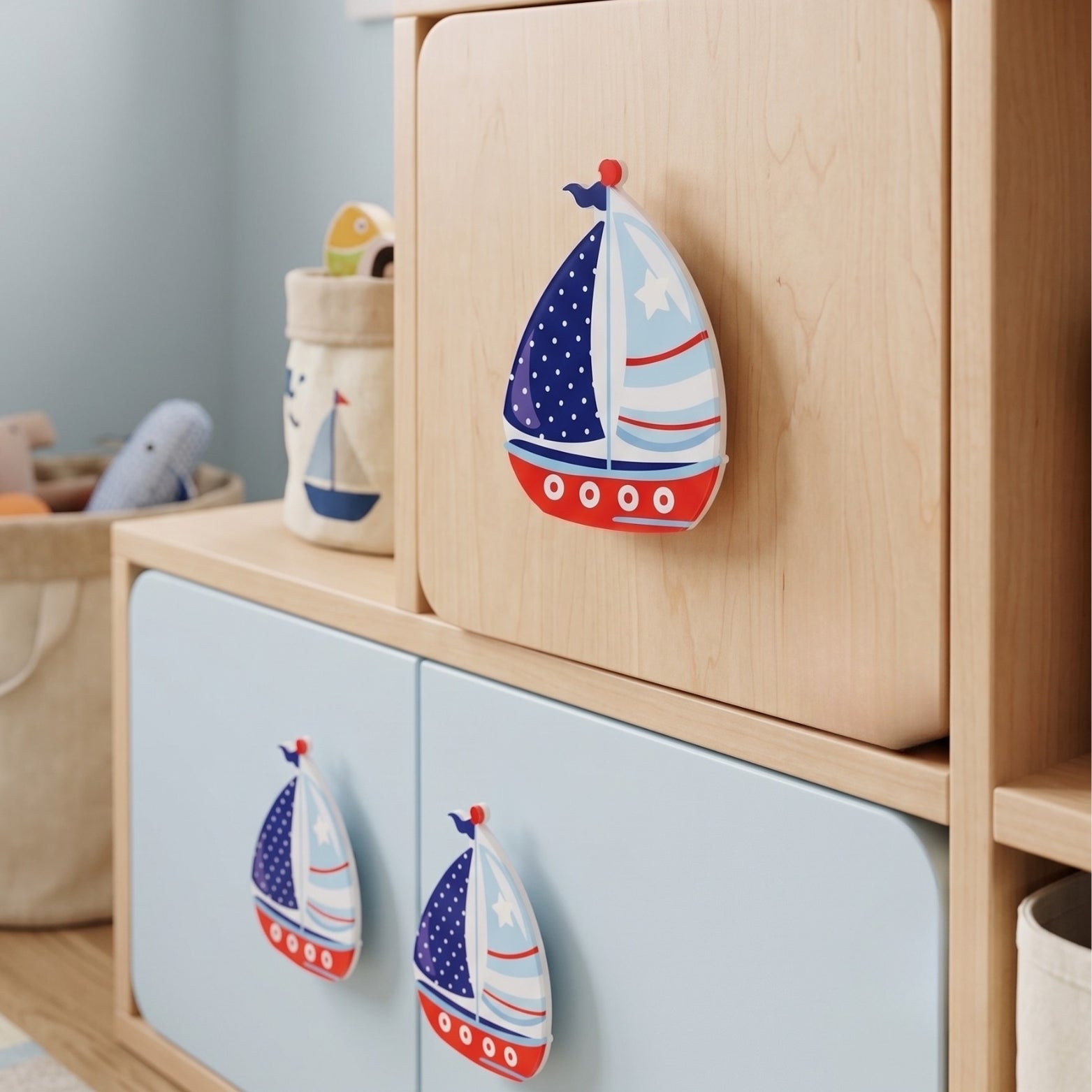 Large and small nautical sailboat acrylic double mount pulls installed on modern kids wooden wardrobe