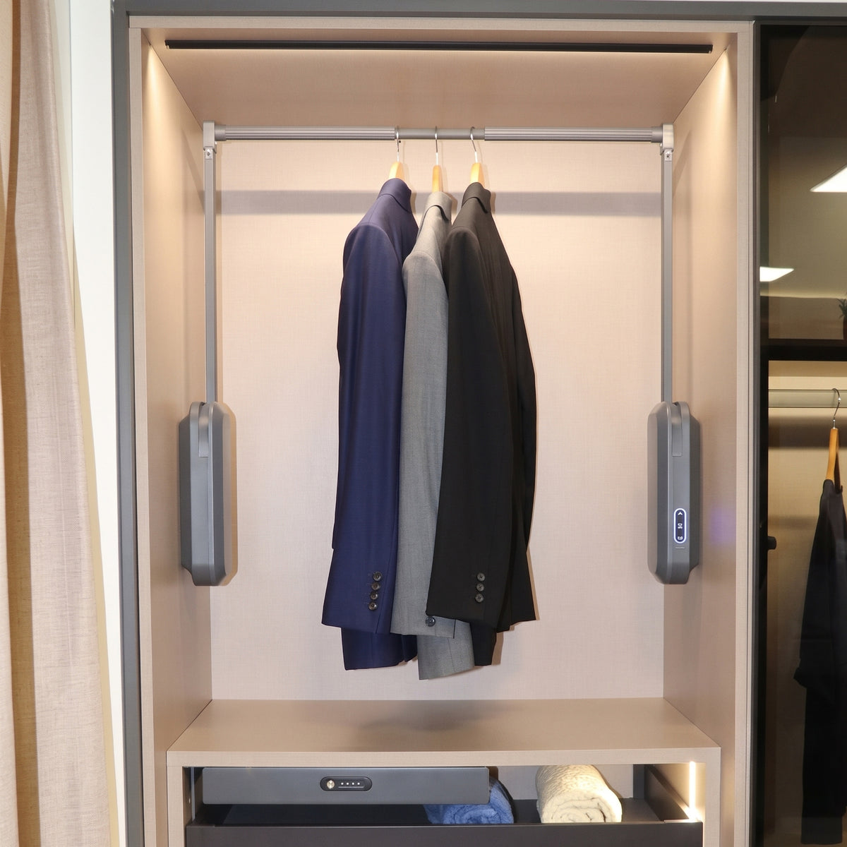 Ebco Livsmart automated wardrobe lift in the raised position holding garments, available for same-day delivery from Hardware Depot Bangalore.