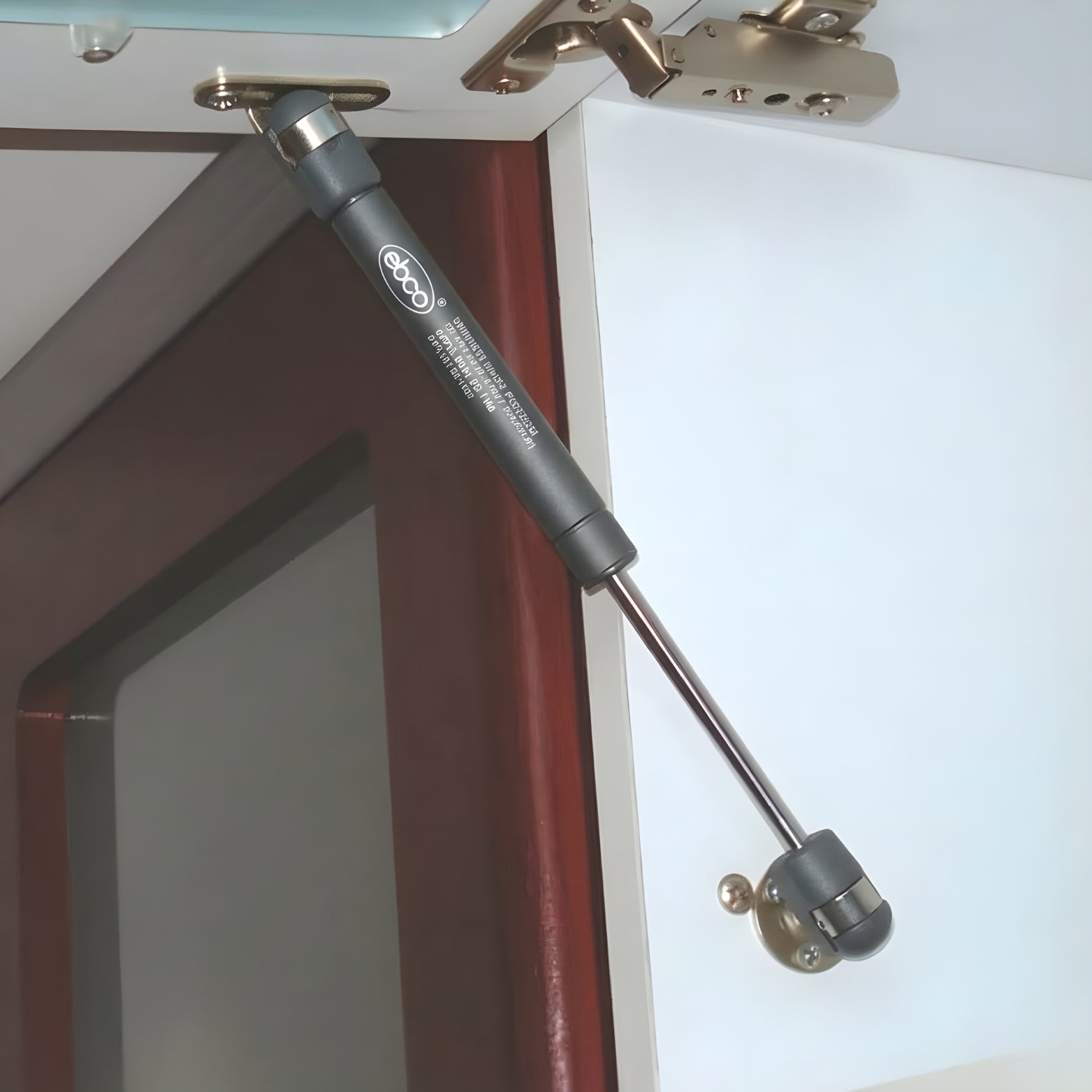 Ebco Pro-Lift Gas Spring installed in a kitchen loft cabinet, providing effortless opening and soft-close functionality for modular kitchens in Bangalore