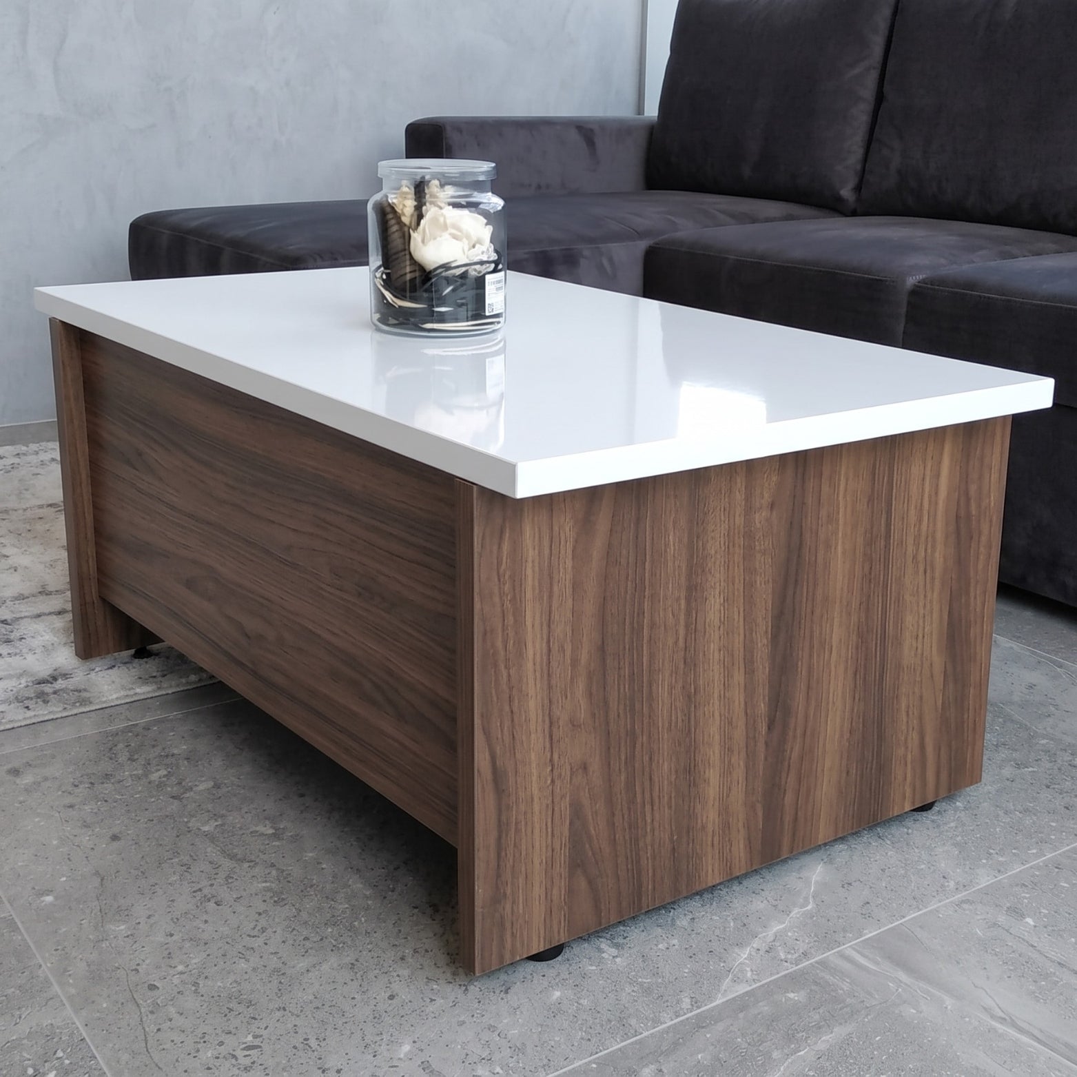 Modern wooden coffee table in closed position fitted with Ebco hidden table lift mechanism from Hardware Depot