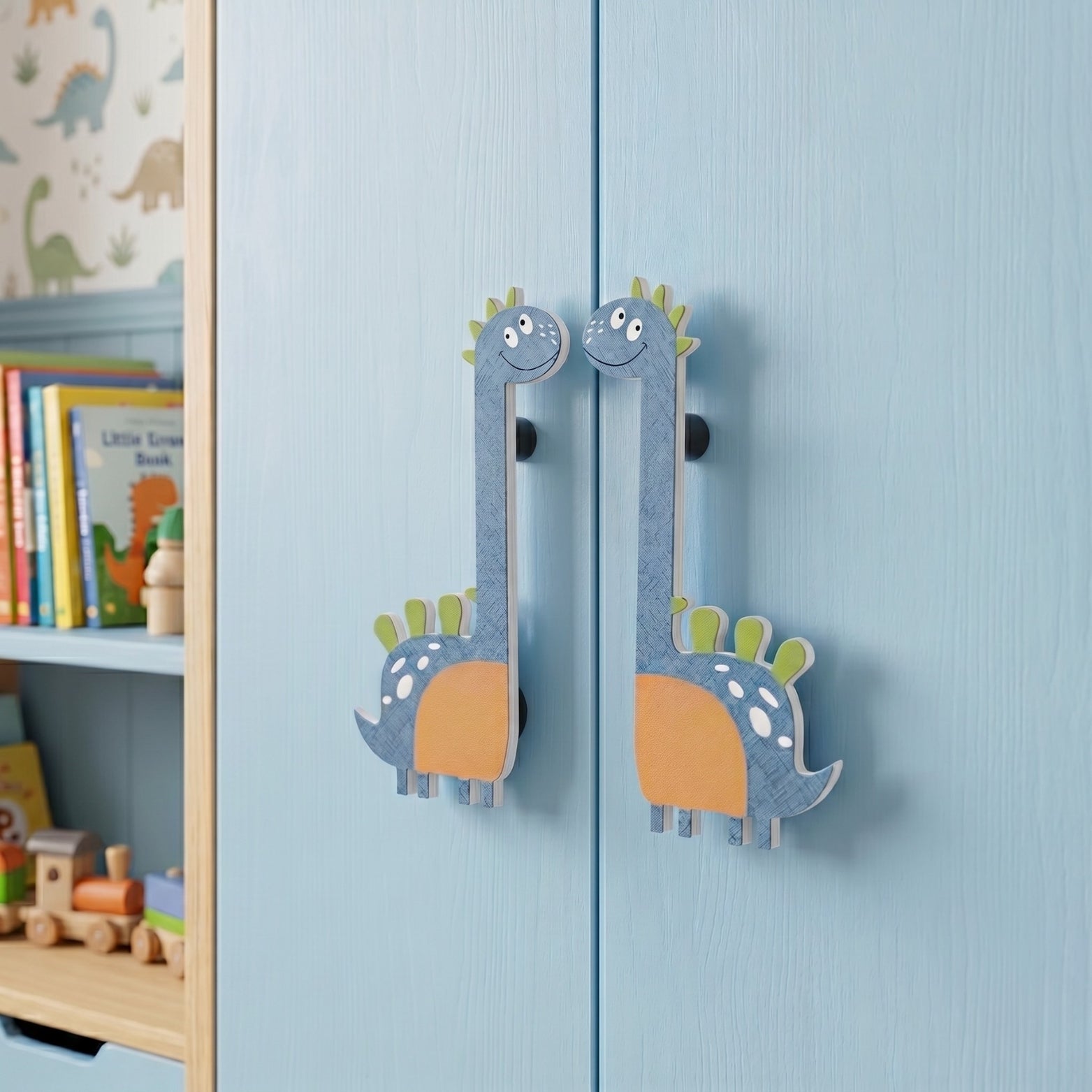 A symmetrical pair of big blue dinosaur acrylic wardrobe handles installed face-to-face on light blue kids' room cabinet doors from Hardware Depot.
