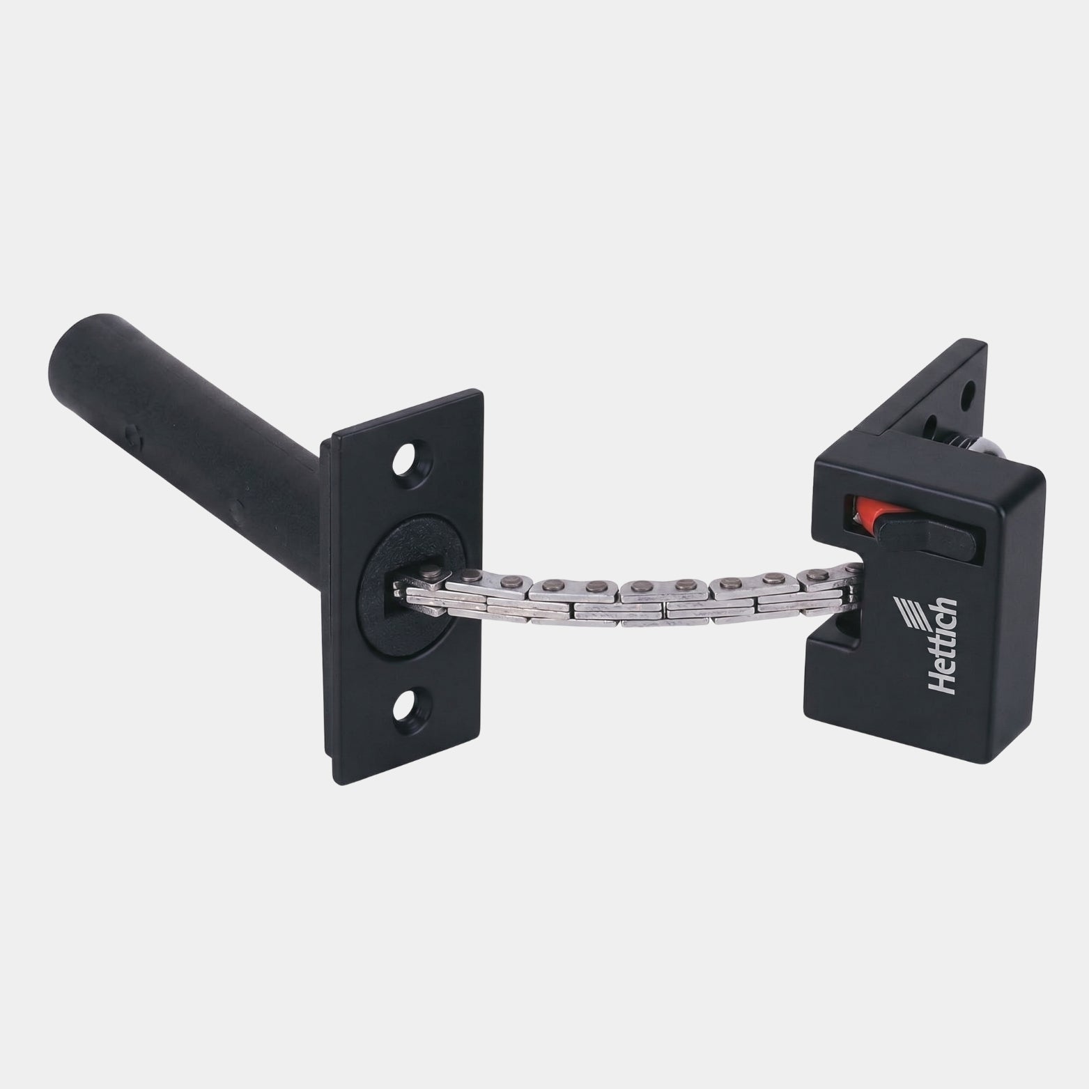 Studio product shot of the Hettich HDC 1 hidden door chain lock mechanism in matte black, showcasing the steel chain links, mounting plates, and integrated plastic concealing sleeve
