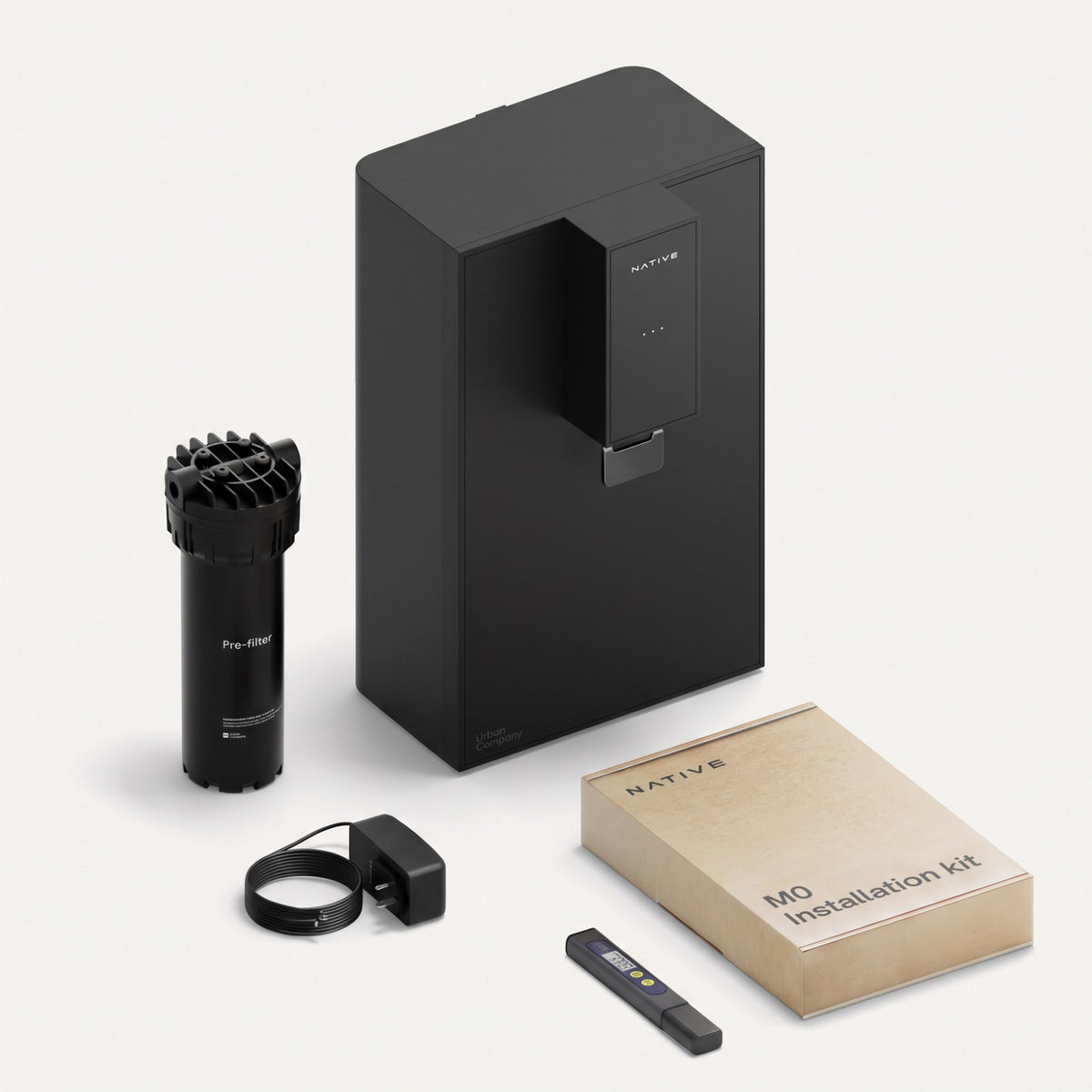 Complete box contents of Native M0 including purifier unit, external pre-filter, TDS meter, adapter, and installation kit.