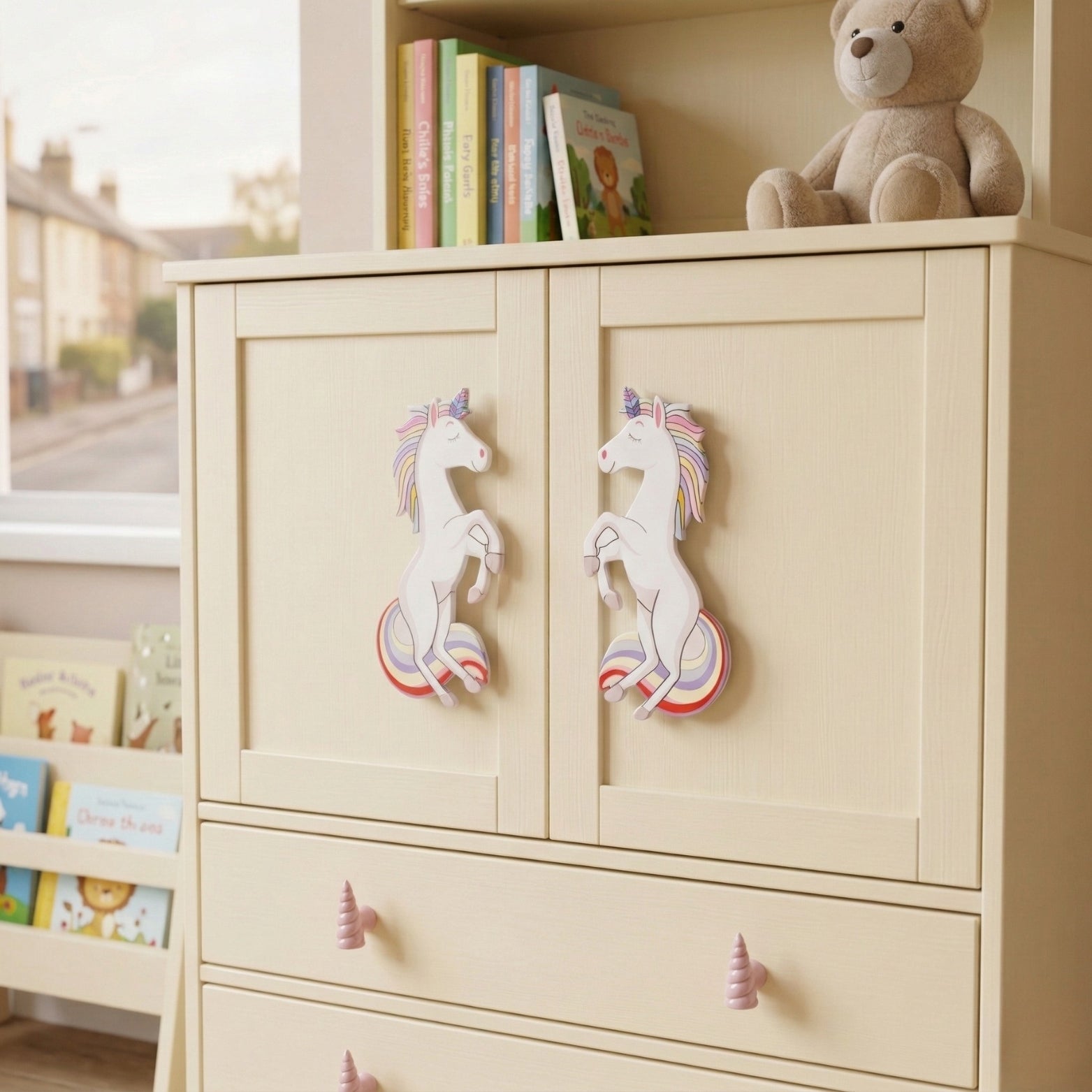 Close-up of a unique 8-inch unicorn handle with a colorful swirling tail and mane, showcasing a playful and vibrant design perfect for a unique child's bedroom or nursery cabinet