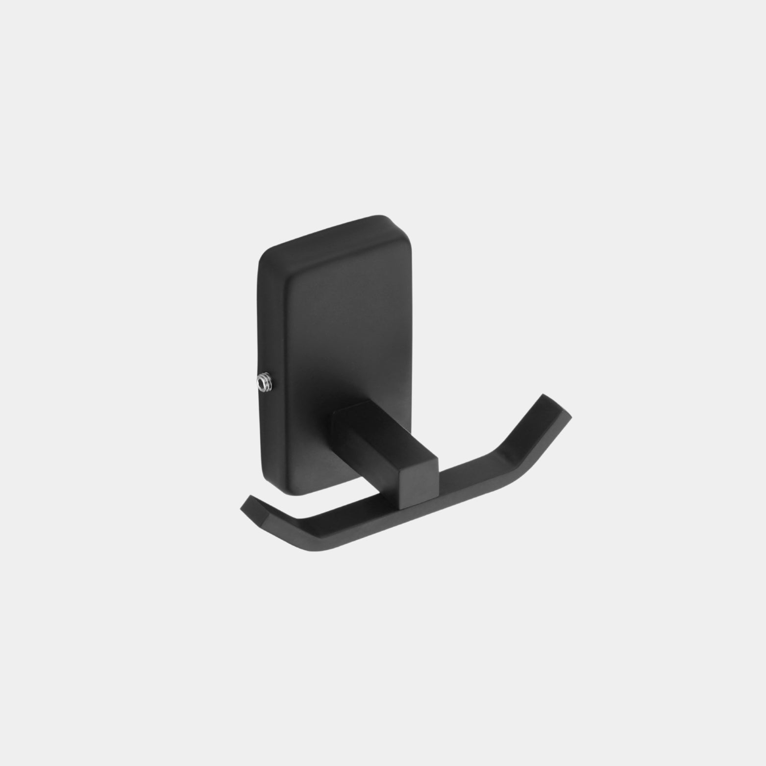 Modern bathroom setting featuring the Sparrow matte black double clothes hook mounted securely onto premium stone tiles.